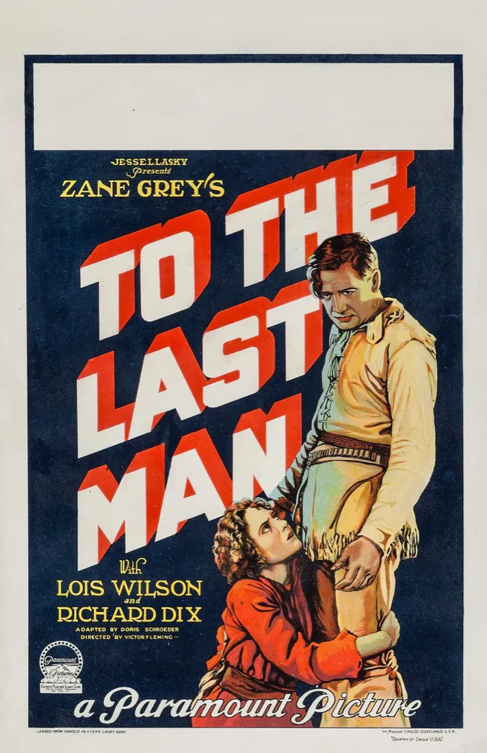 Film poster for To the Last Man with red block letters, a cowboy in buckskin and a woman clinging to him.